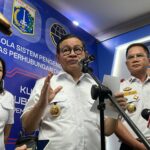 Kepala Badan Pendapatan Daerah DKI Jakarta Lusiana Herawati (kiri), Gubernur DKI Pramono Anung (tengah) dan Kepala Dinas Perhubungan DKI, Syafrin Liputo (kanan)./Ist